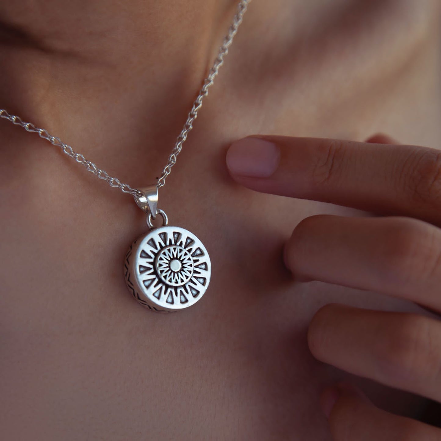 Double Faced Sun Pendant